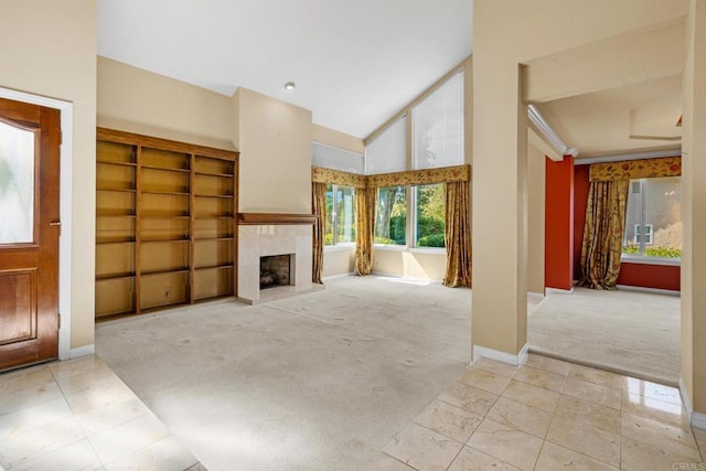 4750 Jeffer Ln, La Mesa, CA 91941 - unfurnished living room featuring light colored carpet, a tiled fireplace, and high vaulted ceiling