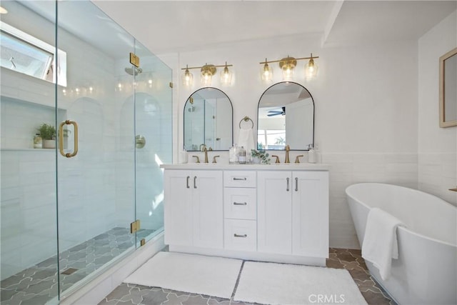 16743 Bayview Dr Unit A, Sunset Beach, CA 90742 - full bath with a soaking tub, a stall shower, and double vanity