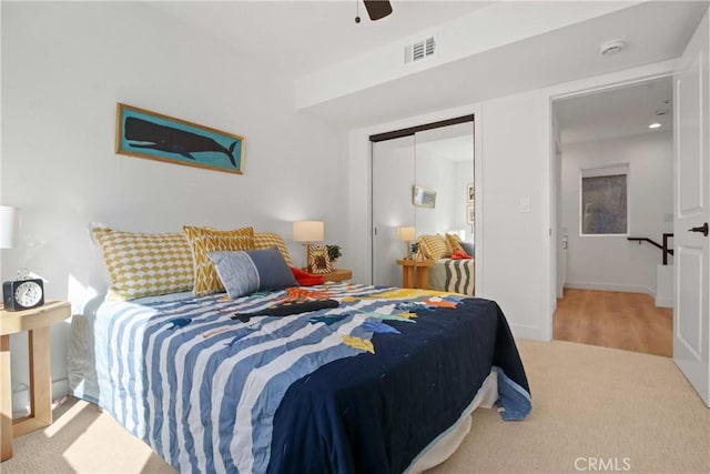 16743 Bayview Dr Unit A, Sunset Beach, CA 90742 - bedroom featuring carpet floors and a ceiling fan