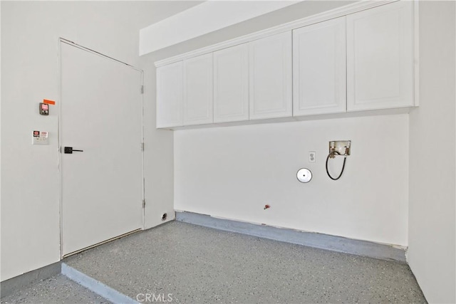 16743 Bayview Dr Unit A, Sunset Beach, CA 90742 - laundry area featuring washer hookup and cabinet space