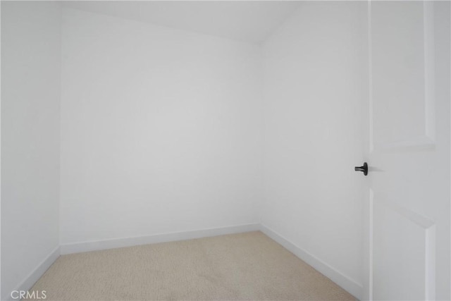 16743 Bayview Dr Unit A, Sunset Beach, CA 90742 - walk in closet featuring light carpet