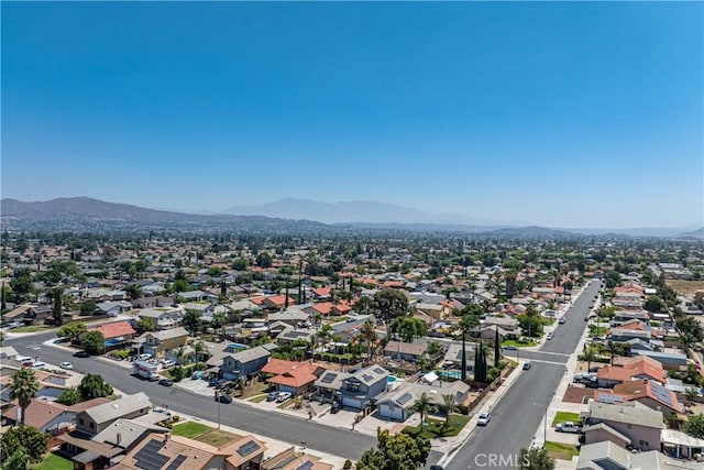 13848 Golden Eagle Ct, Moreno Valley, CA 92553 - aerial perspective of suburban area with a mountainous background