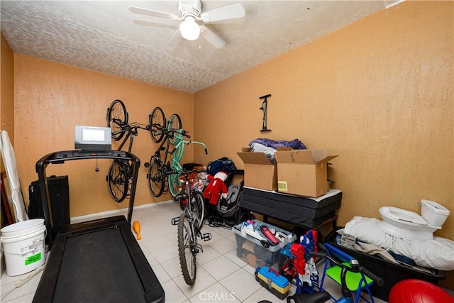 13848 Golden Eagle Ct, Moreno Valley, CA 92553 - workout room with a ceiling fan and tile patterned flooring