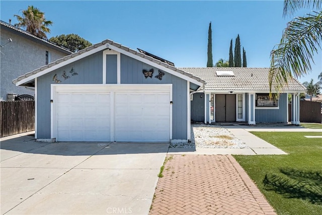 13848 Golden Eagle Ct, Moreno Valley, CA 92553 - ranch-style house featuring a tiled roof, concrete driveway, and a garage