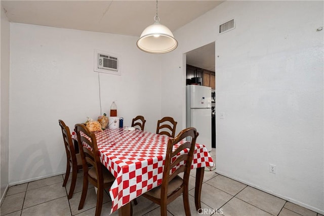 13848 Golden Eagle Ct, Moreno Valley, CA 92553 - dining room with light tile patterned floors and a wall mounted AC
