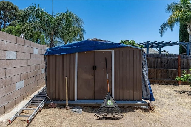 13848 Golden Eagle Ct, Moreno Valley, CA 92553 - view of shed featuring a fenced backyard
