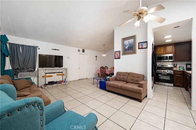 13848 Golden Eagle Ct, Moreno Valley, CA 92553 - living room featuring light tile patterned flooring, a ceiling fan, and vaulted ceiling