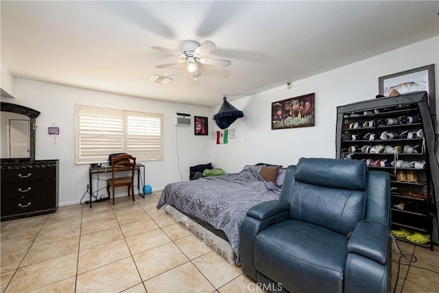 13848 Golden Eagle Ct, Moreno Valley, CA 92553 - bedroom with light tile patterned floors, ceiling fan, and an AC wall unit