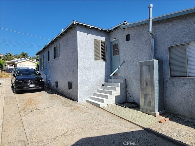 10563 Las Lunitas Ave, Tujunga, CA 91042 - view of home's exterior with entry steps and stucco siding