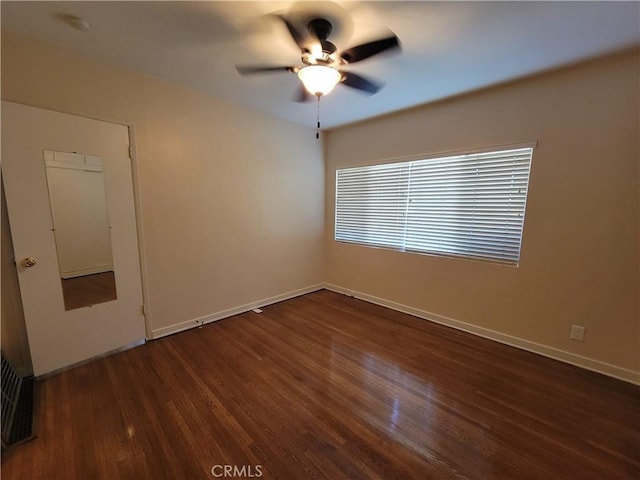 10563 Las Lunitas Ave, Tujunga, CA 91042 - unfurnished room with ceiling fan and dark wood-style flooring