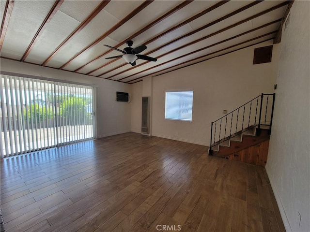 10563 Las Lunitas Ave, Tujunga, CA 91042 - unfurnished living room with lofted ceiling, wood finished floors, ceiling fan, and stairs