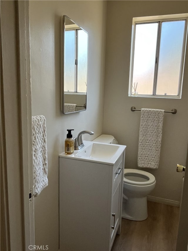 10563 Las Lunitas Ave, Tujunga, CA 91042 - half bathroom featuring vanity and wood finished floors
