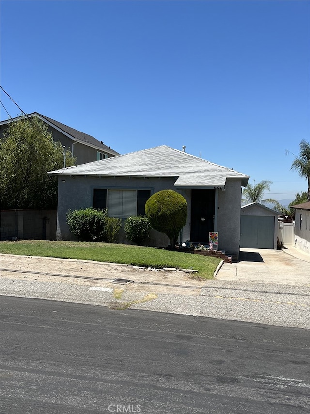 10563 Las Lunitas Ave, Tujunga, CA 91042 - ranch-style house with driveway, a front yard, and stucco siding