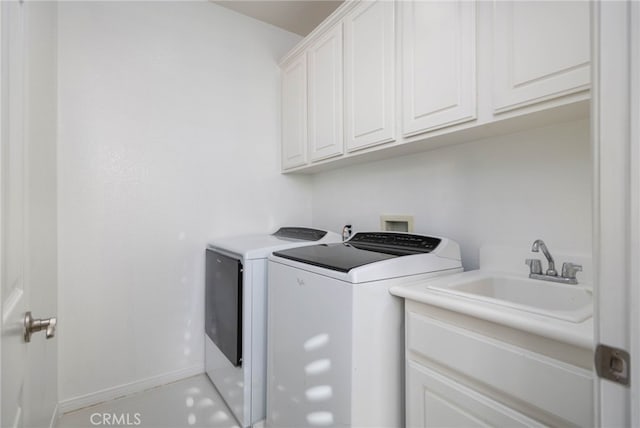 23825 Lancer Ct, Wildomar, CA 92595 - washroom featuring independent washer and dryer and cabinet space