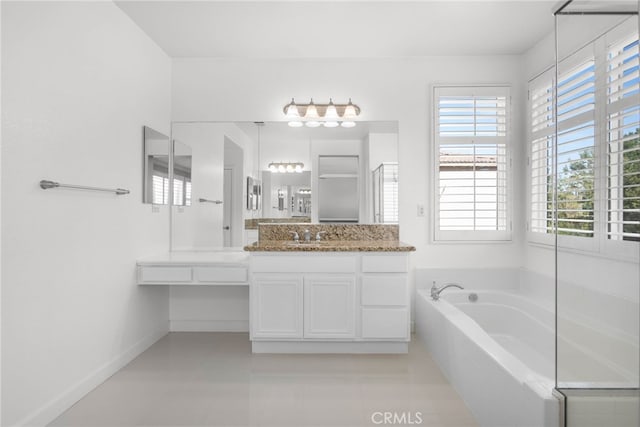 23825 Lancer Ct, Wildomar, CA 92595 - full bath with a garden tub, vanity, and tile patterned floors