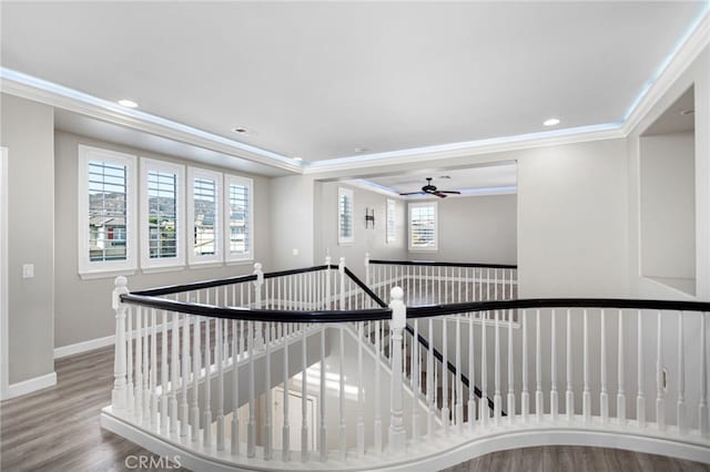 23825 Lancer Ct, Wildomar, CA 92595 - staircase featuring wood finished floors, crown molding, healthy amount of natural light, ceiling fan, and recessed lighting