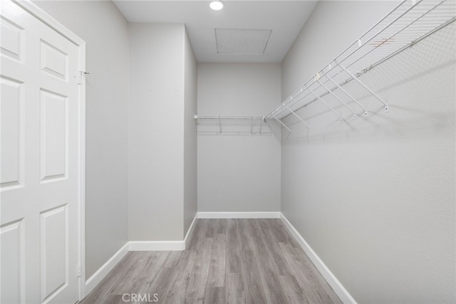 23825 Lancer Ct, Wildomar, CA 92595 - spacious closet featuring wood finished floors