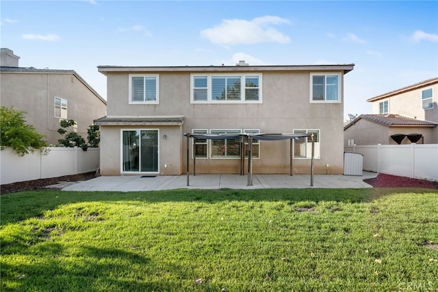 23825 Lancer Ct, Wildomar, CA 92595 - back of house featuring a pergola, a patio area, stucco siding, and a fenced backyard