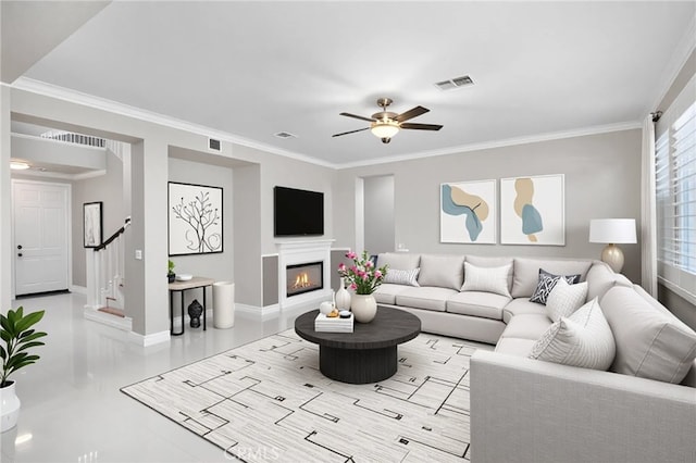 23825 Lancer Ct, Wildomar, CA 92595 - living area with stairway, crown molding, a glass covered fireplace, and ceiling fan