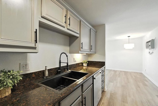 5252 Orange Ave Unit 326, San Diego, CA 92115 - kitchen featuring gray cabinets, dishwasher, light wood finished floors, and hanging light fixtures