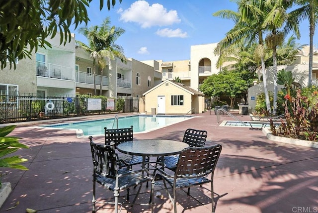 5252 Orange Ave Unit 326, San Diego, CA 92115 - community pool featuring a residential view and a patio