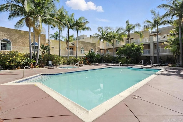 5252 Orange Ave Unit 326, San Diego, CA 92115 - community pool featuring a patio and a residential view