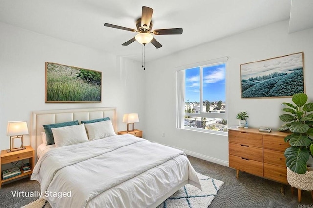 5252 Orange Ave Unit 326, San Diego, CA 92115 - bedroom with dark colored carpet and a ceiling fan