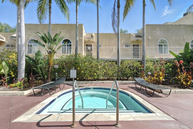 5252 Orange Ave Unit 326, San Diego, CA 92115 - view of swimming pool with a hot tub and a pool