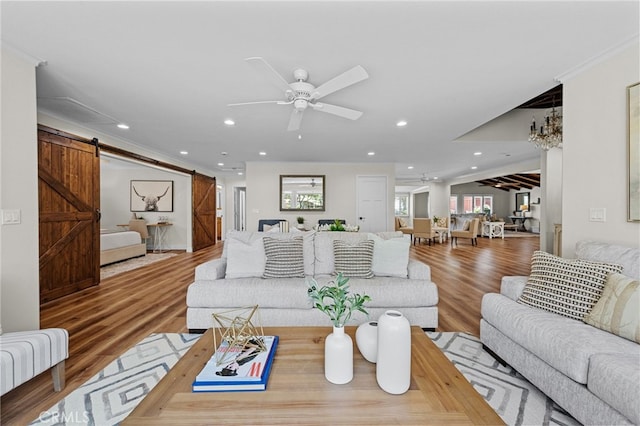 2777 Shadow Canyon Cir, Norco, CA 92860 - living room with a barn door, ceiling fan, wood finished floors, and recessed lighting