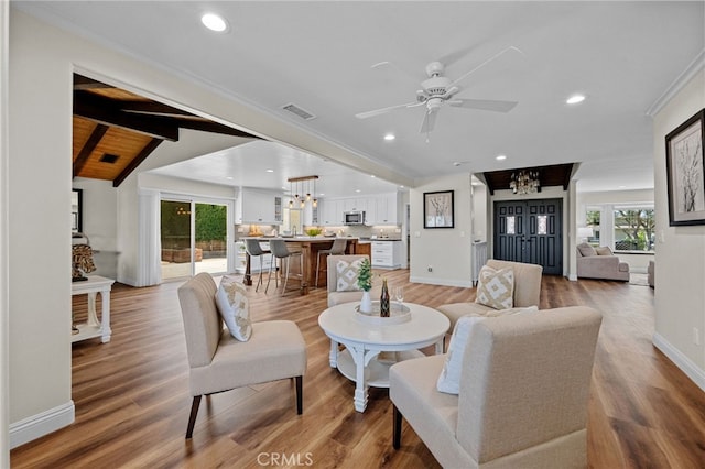 2777 Shadow Canyon Cir, Norco, CA 92860 - living area with a chandelier, plenty of natural light, ceiling fan, light wood finished floors, and recessed lighting