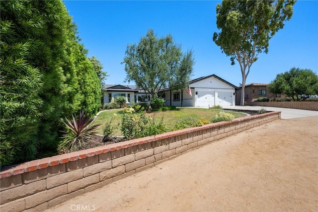 2777 Shadow Canyon Cir, Norco, CA 92860 - ranch-style home featuring driveway, an attached garage, and a front yard