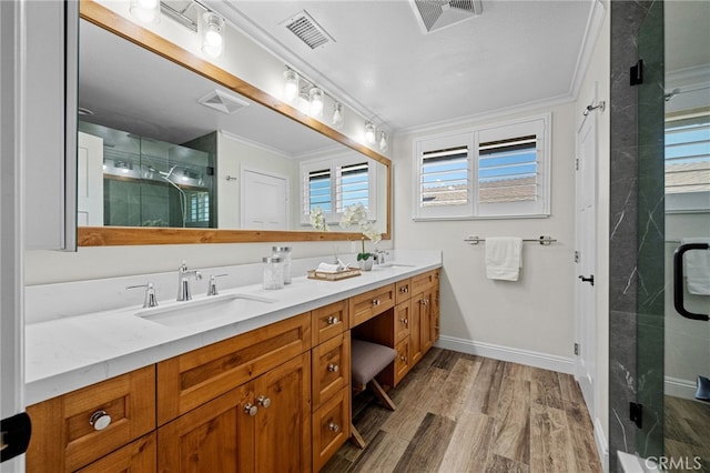 2777 Shadow Canyon Cir, Norco, CA 92860 - full bath featuring ornamental molding, double vanity, a shower stall, and wood finished floors