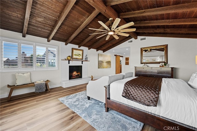 2777 Shadow Canyon Cir, Norco, CA 92860 - bedroom with wood ceiling, a brick fireplace, wood finished floors, and ceiling fan