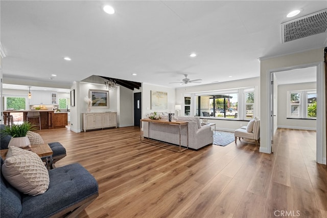 2777 Shadow Canyon Cir, Norco, CA 92860 - living room with recessed lighting, light wood-type flooring, ceiling fan, and ornamental molding