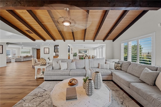 2777 Shadow Canyon Cir, Norco, CA 92860 - living room featuring a wood ceiling with exposed beams, ceiling fan, wood finished floors, and high vaulted ceiling