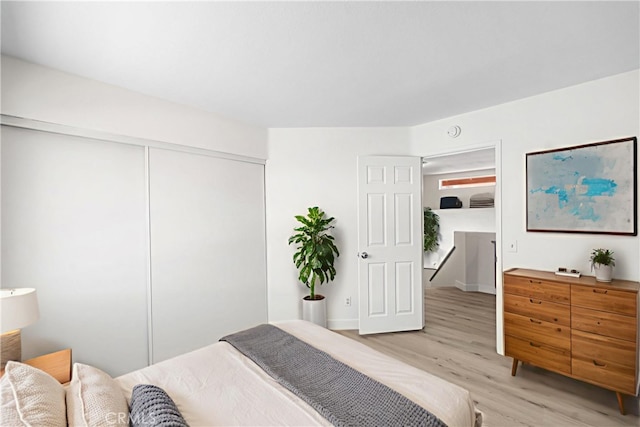 39524 Hawthorne St, Palmdale, CA 93551 - bedroom with light wood-style flooring and a closet