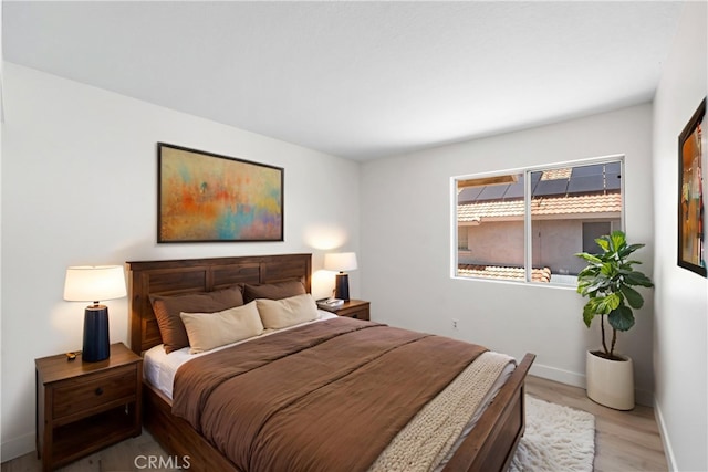 39524 Hawthorne St, Palmdale, CA 93551 - bedroom with baseboards and wood finished floors
