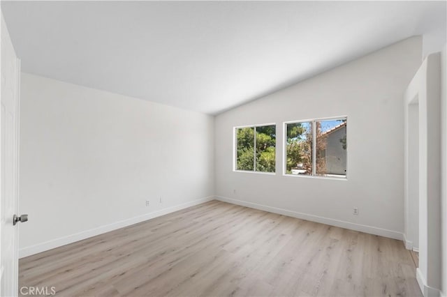 39524 Hawthorne St, Palmdale, CA 93551 - unfurnished room featuring lofted ceiling and light wood-style floors