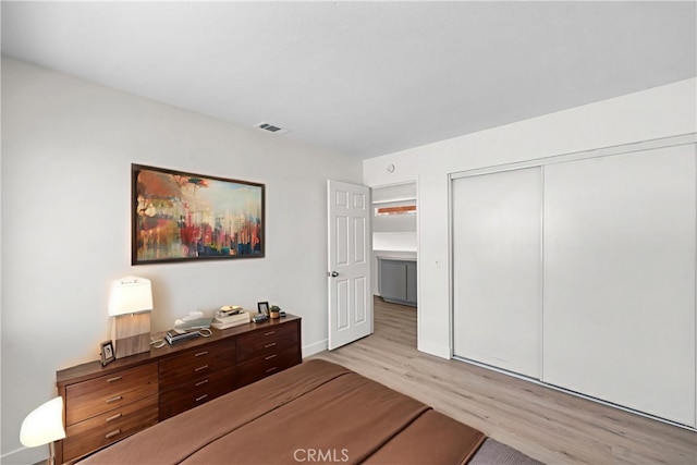 39524 Hawthorne St, Palmdale, CA 93551 - bedroom featuring light wood-style flooring and a closet
