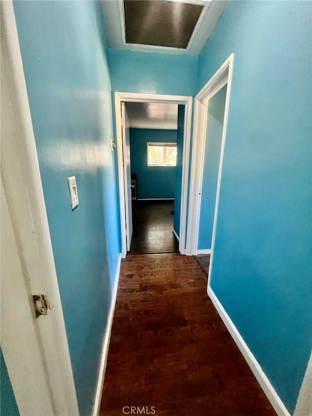 14712 Hiawatha St, San Fernando, CA 91345 - corridor featuring wood finished floors and attic access