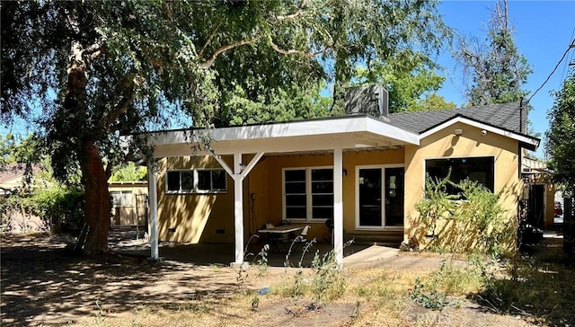 14712 Hiawatha St, San Fernando, CA 91345 - rear view of property with roof with shingles, a chimney, stucco siding, and a patio area
