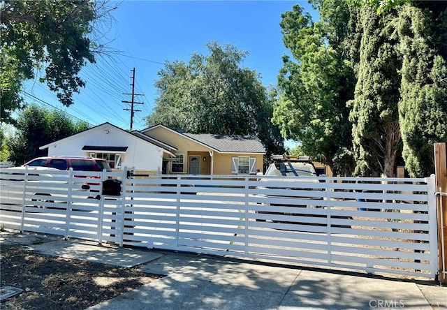 14712 Hiawatha St, San Fernando, CA 91345 - view of front of home featuring a fenced front yard and a gate
