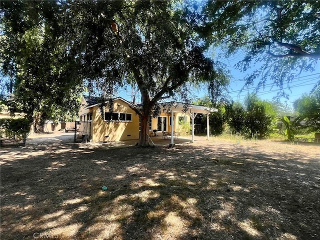 14712 Hiawatha St, San Fernando, CA 91345 - rear view of house with a patio