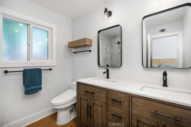 7 Via Olorosa, Rancho Santa Margarita, CA 92688 - bathroom with double vanity and wood finished floors