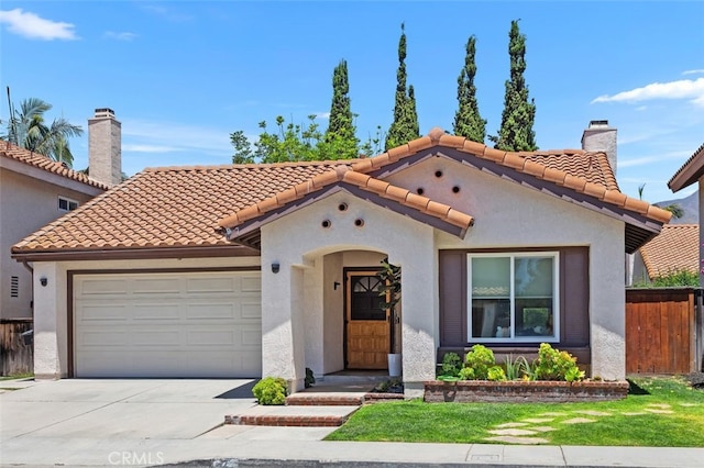 7 Via Olorosa, Rancho Santa Margarita, CA 92688 - mediterranean / spanish house with an attached garage, driveway, and stucco siding