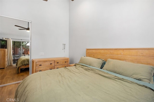 7 Via Olorosa, Rancho Santa Margarita, CA 92688 - bedroom with wood finished floors, ceiling fan, and access to exterior