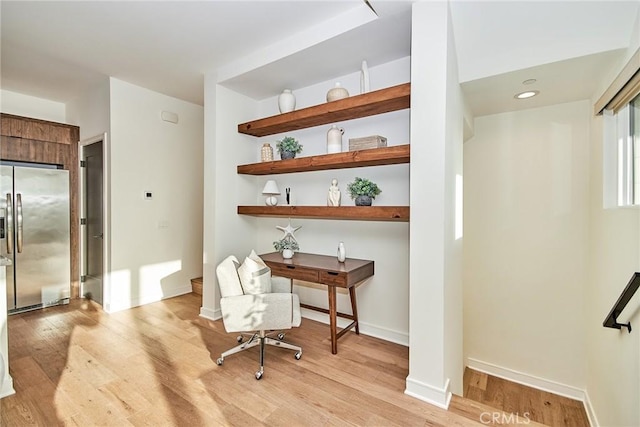 1050 N Joels Pl, Los Angeles, CA 90012 - office featuring light wood-style flooring and baseboards