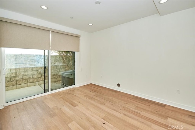1050 N Joels Pl, Los Angeles, CA 90012 - unfurnished room featuring light wood-style floors and recessed lighting