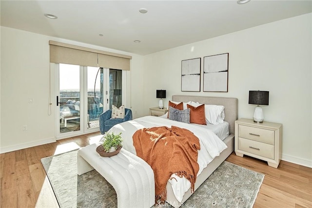 1050 N Joels Pl, Los Angeles, CA 90012 - bedroom with access to exterior and light wood finished floors