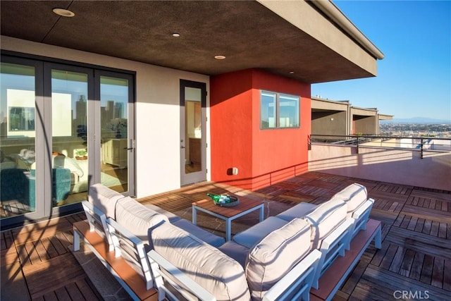 1050 N Joels Pl, Los Angeles, CA 90012 - wooden deck featuring french doors and an outdoor living space